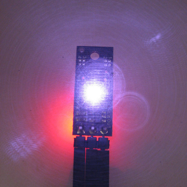 Using a camera with no IR filter, we can see the infrared light being emitted by the distance sensor